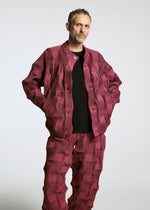 A model wears the A-POC ABLE ISSEY MIYAKE TYPE O 018 clothing.