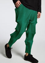 A model wears the A-POC ABLE ISSEY MIYAKE TYPE O 007 trousers.