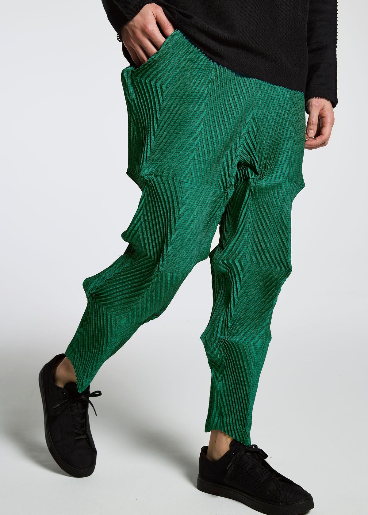 A model wears the A-POC ABLE ISSEY MIYAKE TYPE O 007 trousers.
