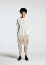 A model wears the A-POC ABLE ISSEY MIYAKE TYPE S 001 3 trousers.
