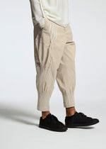 A model wears the A-POC ABLE ISSEY MIYAKE TYPE S 001 3 trousers.