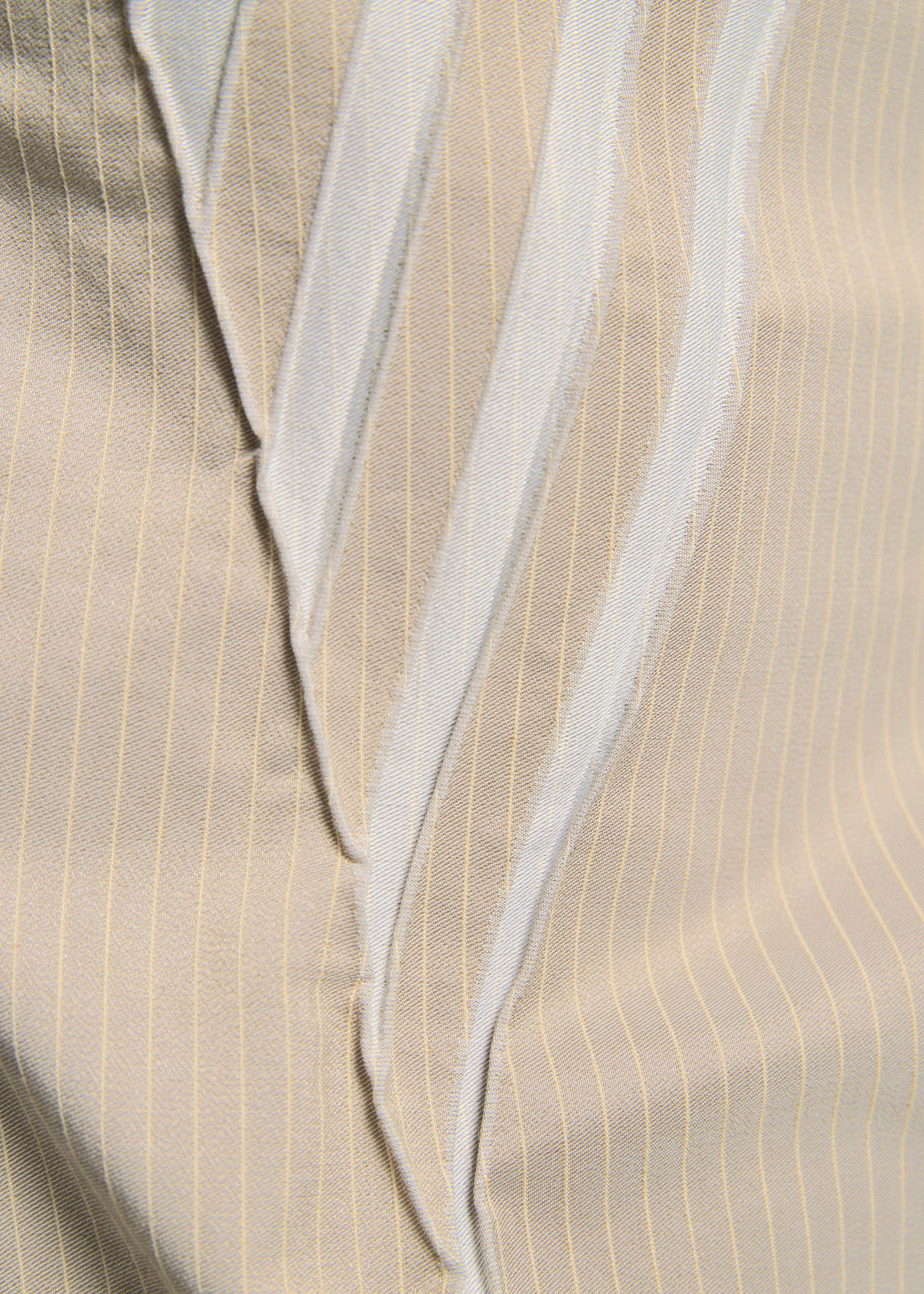 A model wears the A-POC ABLE ISSEY MIYAKE TYPE S 001 3 trousers.