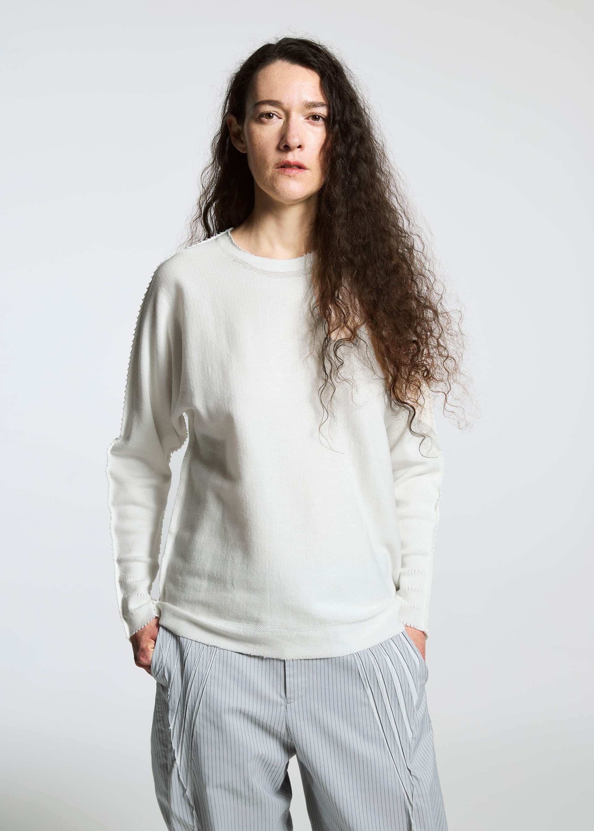 A model wears the A-POC ABLE ISSEY MIYAKE TYPE S 001 3 trousers.