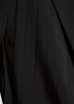 A model wears the A-POC ABLE ISSEY MIYAKE TYPE I 007 trousers.