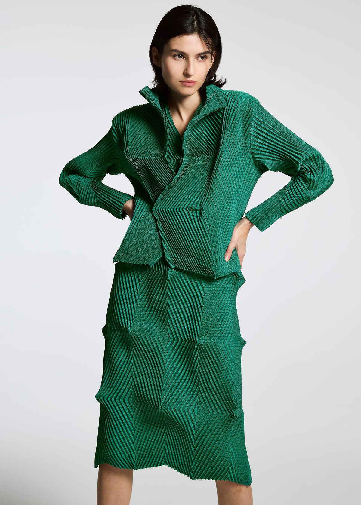 A model wears the A-POC ABLE ISSEY MIYAKE TYPE O 007 dress.