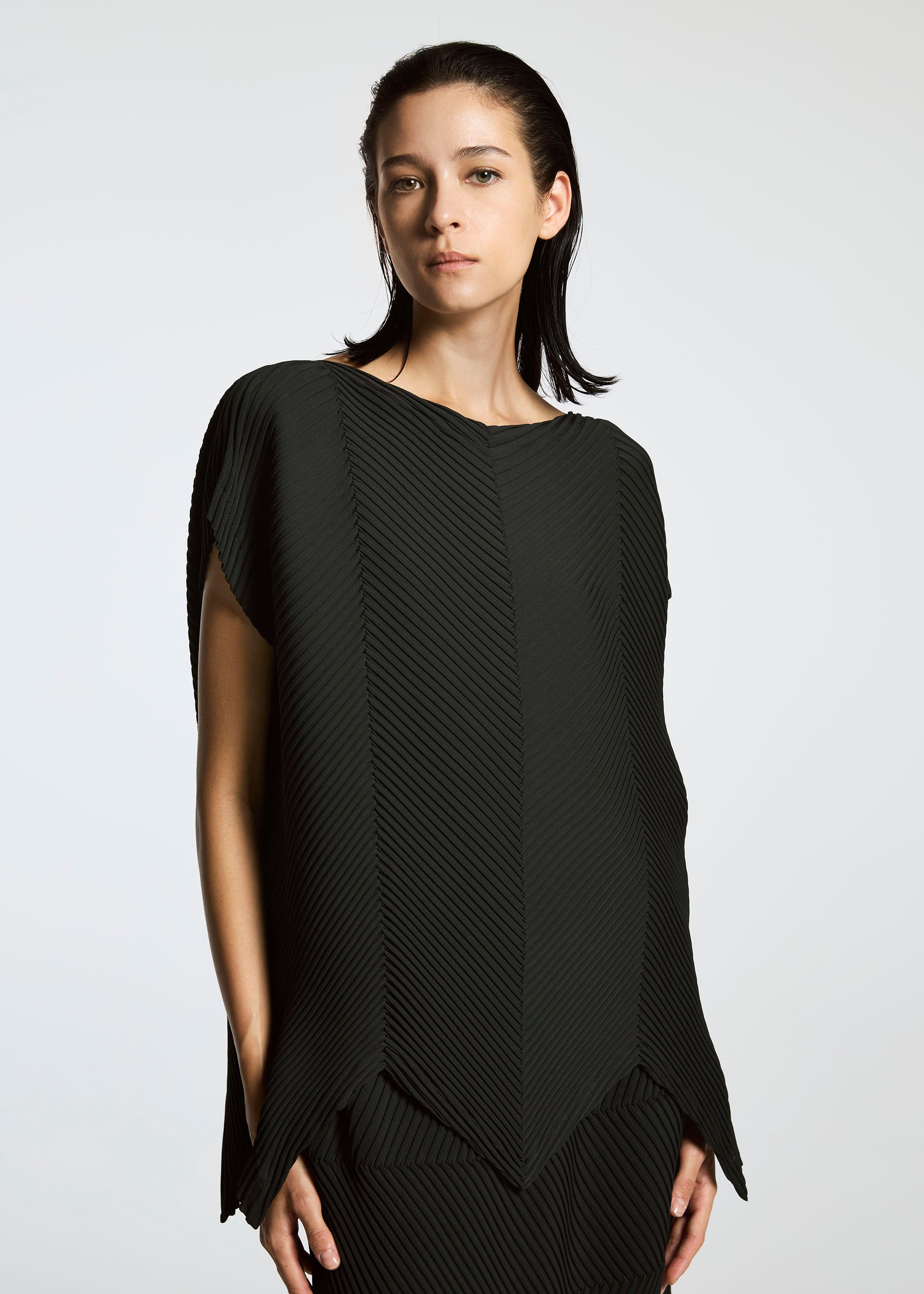 A model wears the A-POC ABLE ISSEY MIYAKE TYPE P 004 shirt.