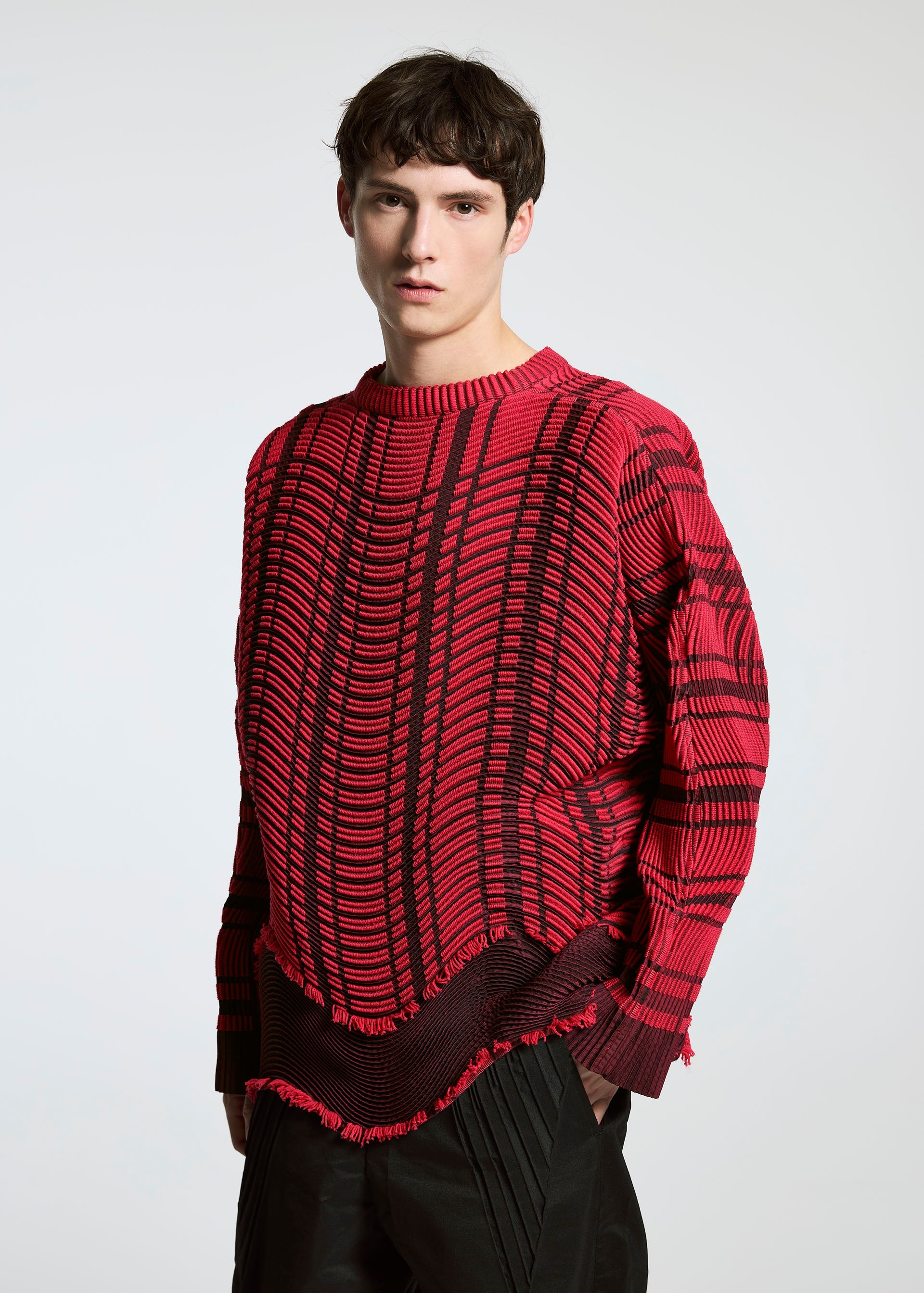 A model wears the A-POC ABLE ISSEY MIYAKE TYPE W 010 clothing.