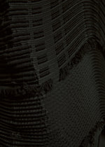 A model wears the A-POC ABLE ISSEY MIYAKE TYPE W 010 clothing.