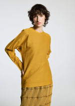 A model wears the A-POC ABLE ISSEY MIYAKE TYPE A 001 1 top.