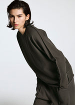 A model wears the A-POC ABLE ISSEY MIYAKE TYPE A 001 3 clothing.