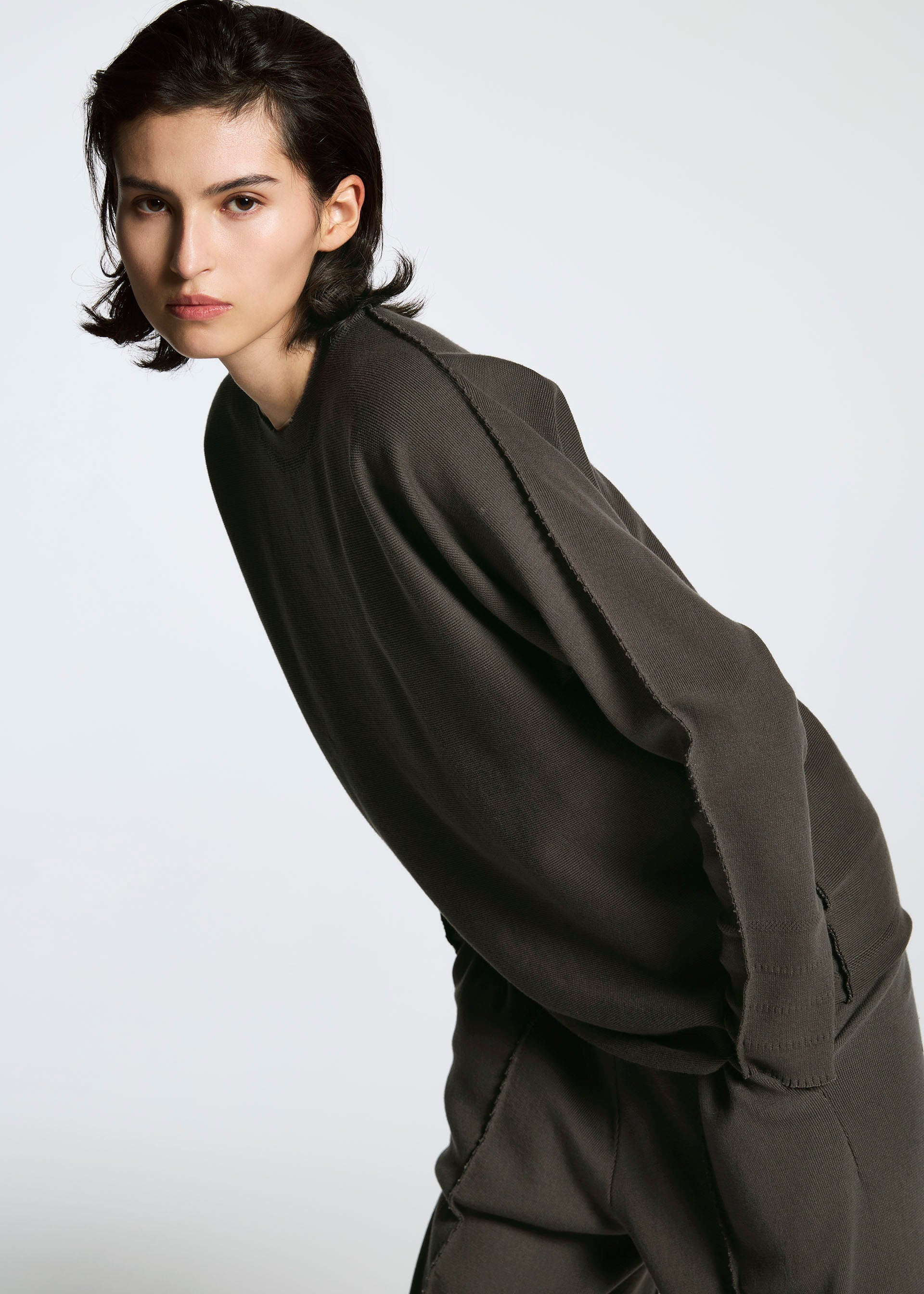 A model wears the A-POC ABLE ISSEY MIYAKE TYPE A 001 3 clothing.