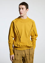 A model wears the A-POC ABLE ISSEY MIYAKE TYPE K 001 top.