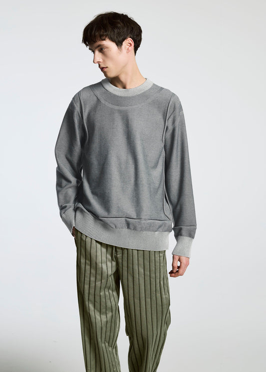 A model wears the A-POC ABLE ISSEY MIYAKE TYPE K 005 top.