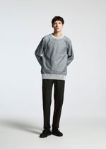 A model wears the A-POC ABLE ISSEY MIYAKE TYPE K 005 top.