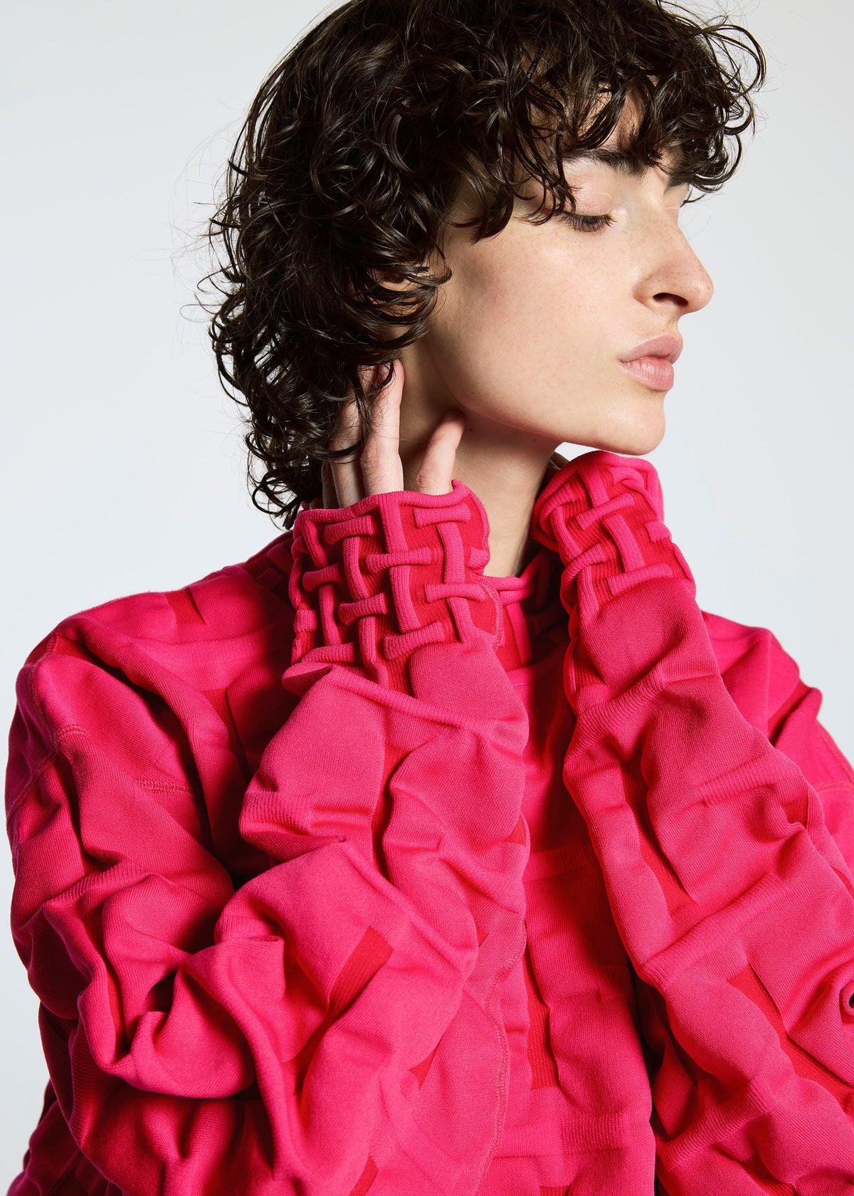 A model wears the A-POC ABLE ISSEY MIYAKE TYPE K 007 clothing.