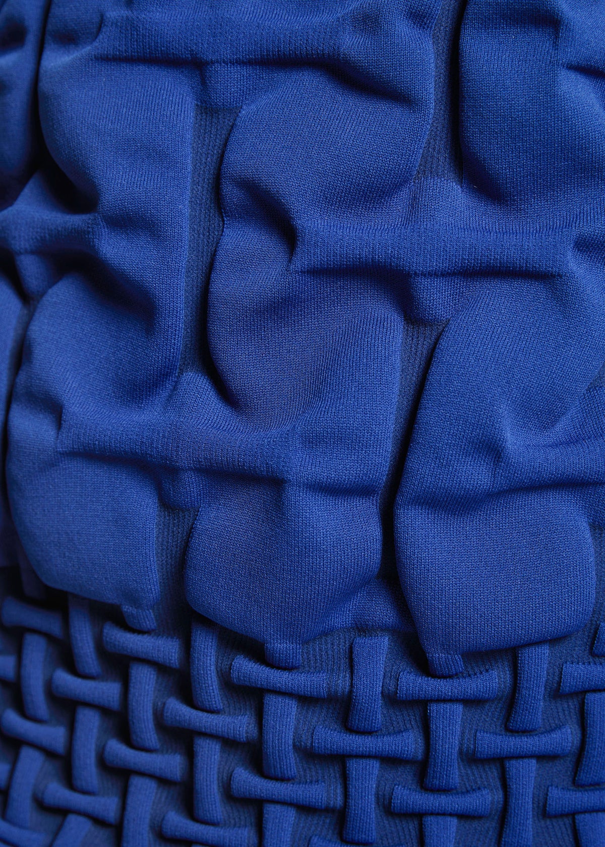 A model wears the A-POC ABLE ISSEY MIYAKE TYPE K 007 clothing.