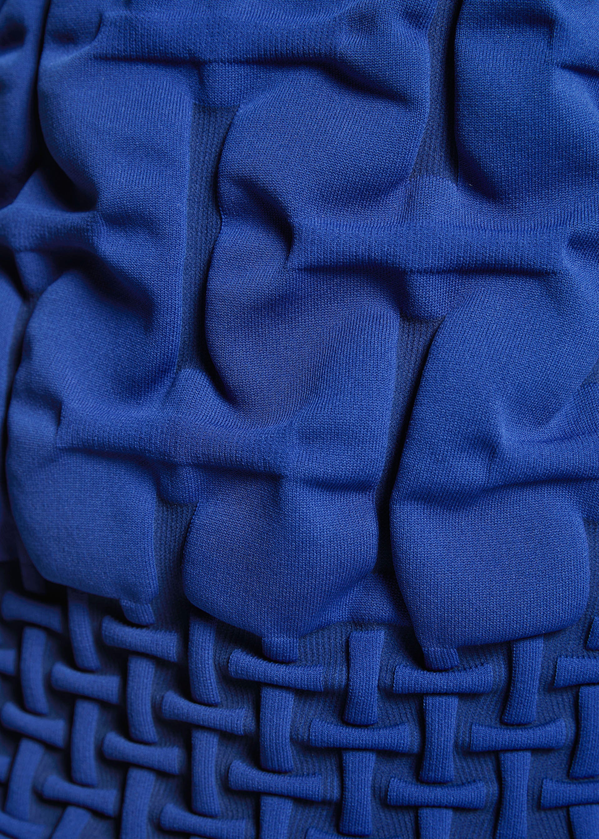 A model wears the A-POC ABLE ISSEY MIYAKE TYPE K 007 clothing.