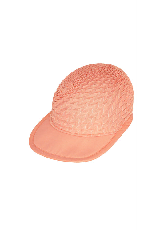 A product shot of the A-POC ABLE ISSEY MIYAKE TYPE O CAP cap in light orange (31).