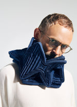 A model wears the A-POC ABLE ISSEY MIYAKE TYPE-O STOLE 002 type-o-stole-002-stole-off-white.