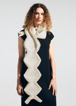 A model wears the A-POC ABLE ISSEY MIYAKE TYPE-O STOLE 002 type-o-stole-002-stole-navy.