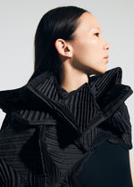 A model wears the A-POC ABLE ISSEY MIYAKE TYPE-O STOLE 002 type-o-stole-002-stole-navy.