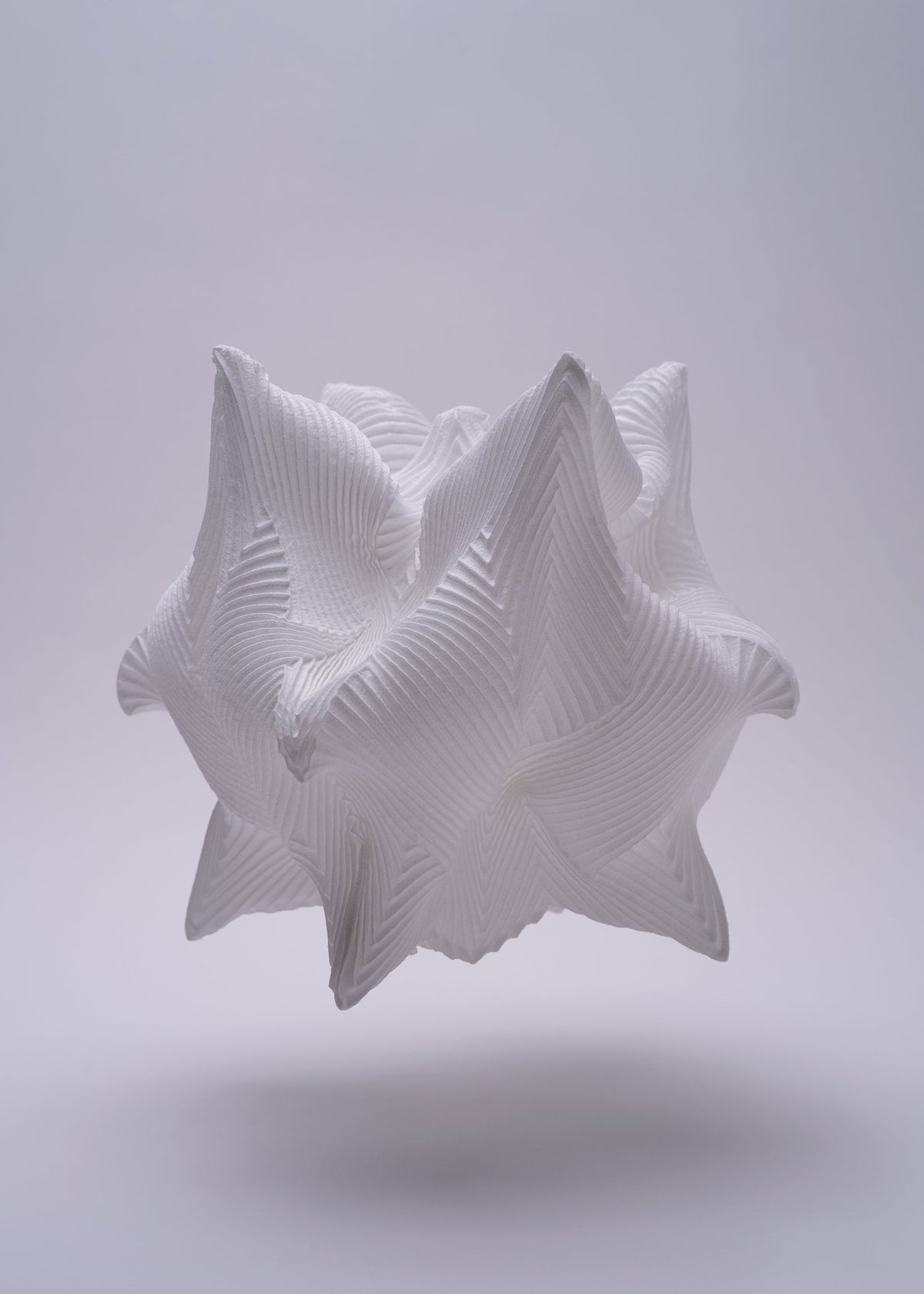 A detail shot of the A-POC ABLE ISSEY MIYAKE TYPE XIII Atelier Oi project accessory.
