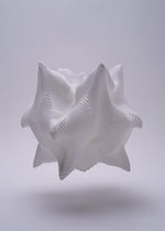 A detail shot of the A-POC ABLE ISSEY MIYAKE TYPE XIII Atelier Oi project accessory.