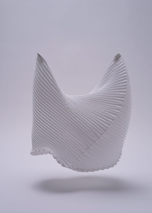 A detail shot of the A-POC ABLE ISSEY MIYAKE TYPE XIII Atelier Oï project accessory.