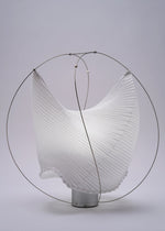 A detail shot of the A-POC ABLE ISSEY MIYAKE TYPE XIII Atelier Oï project accessory.