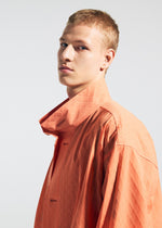 A model wears the A-POC ABLE ISSEY MIYAKE TYPE T 001 1 coat.