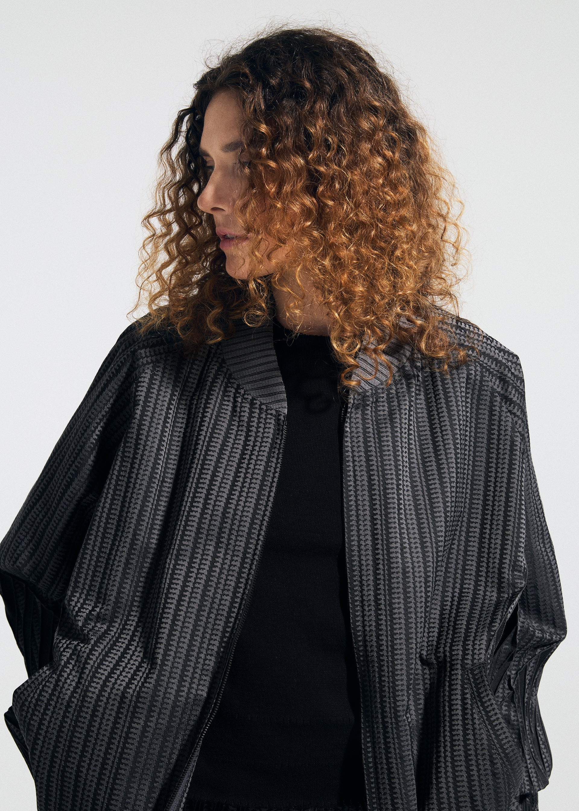 A model wears the A-POC ABLE ISSEY MIYAKE TYPE S 001 1 jacket.