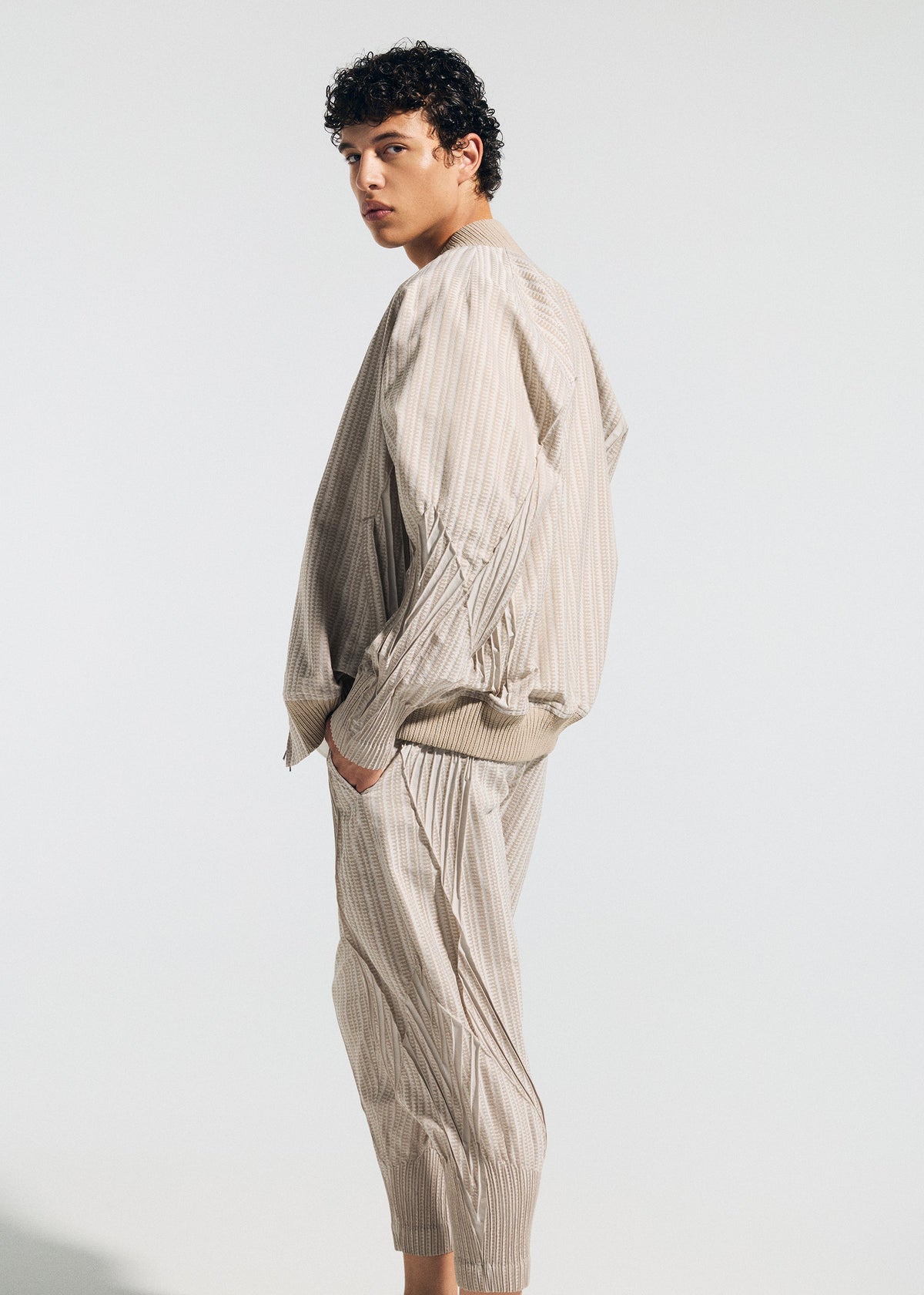 A model wears the A-POC ABLE ISSEY MIYAKE TYPE S 001 1 jacket.