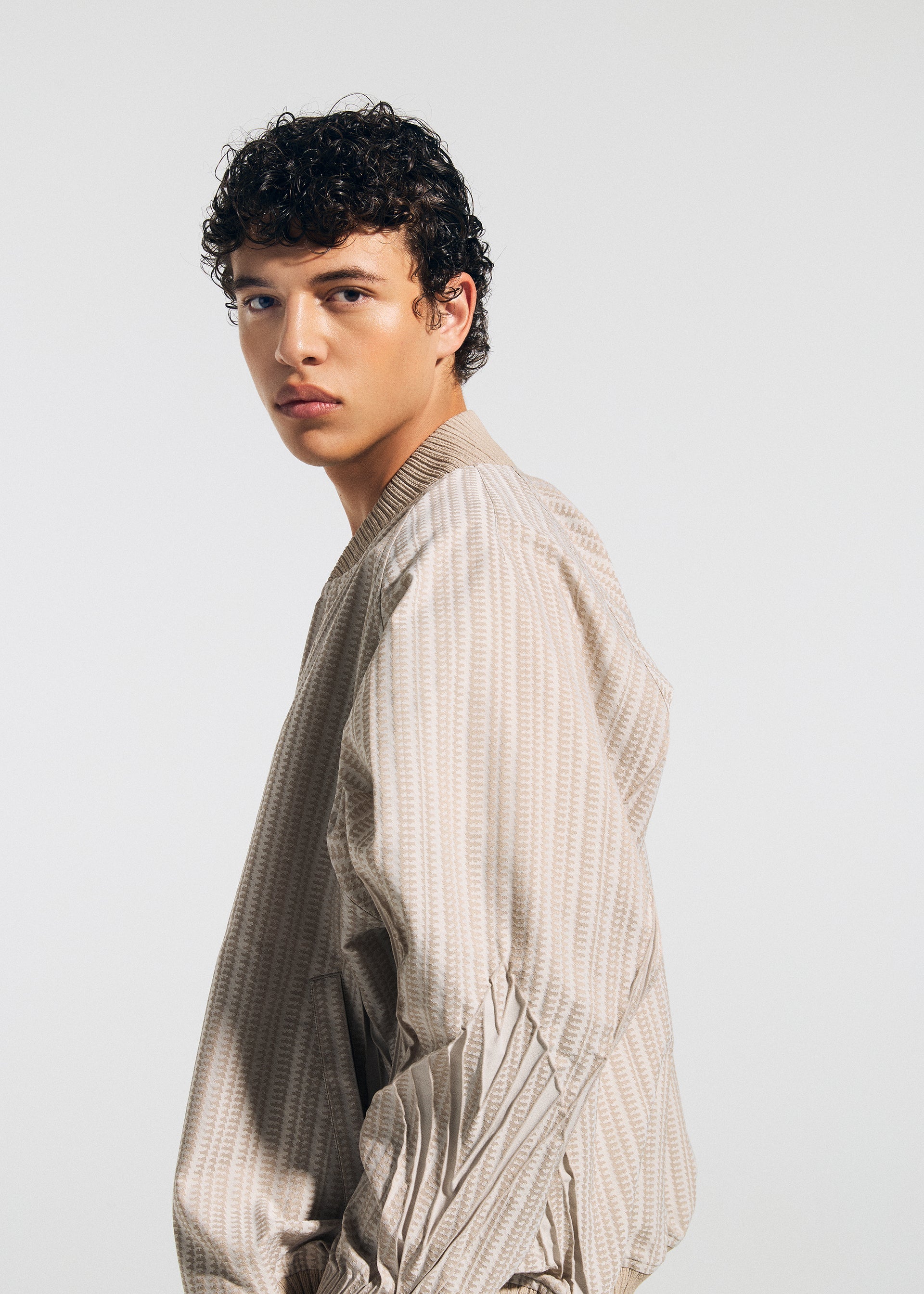 A model wears the A-POC ABLE ISSEY MIYAKE TYPE S 001 1 jacket.