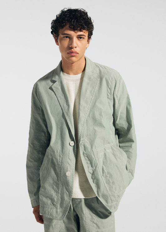 A model wears the A-POC ABLE ISSEY MIYAKE TYPE-U 001 type-u-001-jacket-ivory.