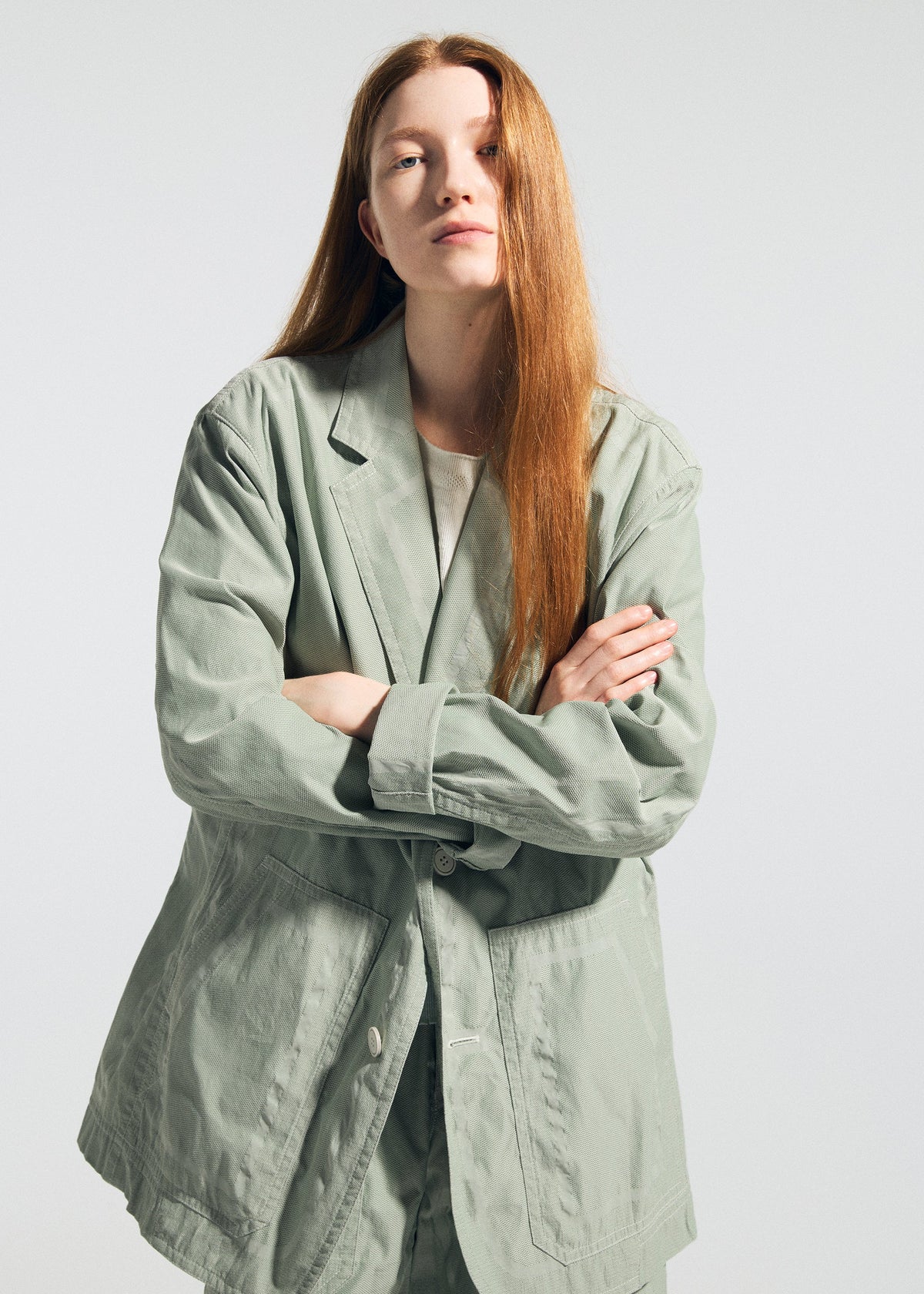 A model wears the A-POC ABLE ISSEY MIYAKE TYPE-U 001 type-u-001-jacket-ivory.