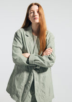 A model wears the A-POC ABLE ISSEY MIYAKE TYPE-U 001 type-u-001-jacket-ivory.