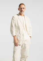 A model wears the A-POC ABLE ISSEY MIYAKE TYPE-U 001 type-u-001-jacket-ivory.