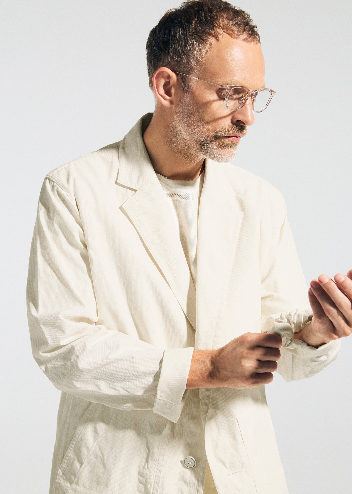 A model wears the A-POC ABLE ISSEY MIYAKE TYPE-U 001 type-u-001-jacket-ivory.