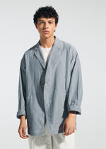 A model wears the A-POC ABLE ISSEY MIYAKE TYPE U 002 jacket.