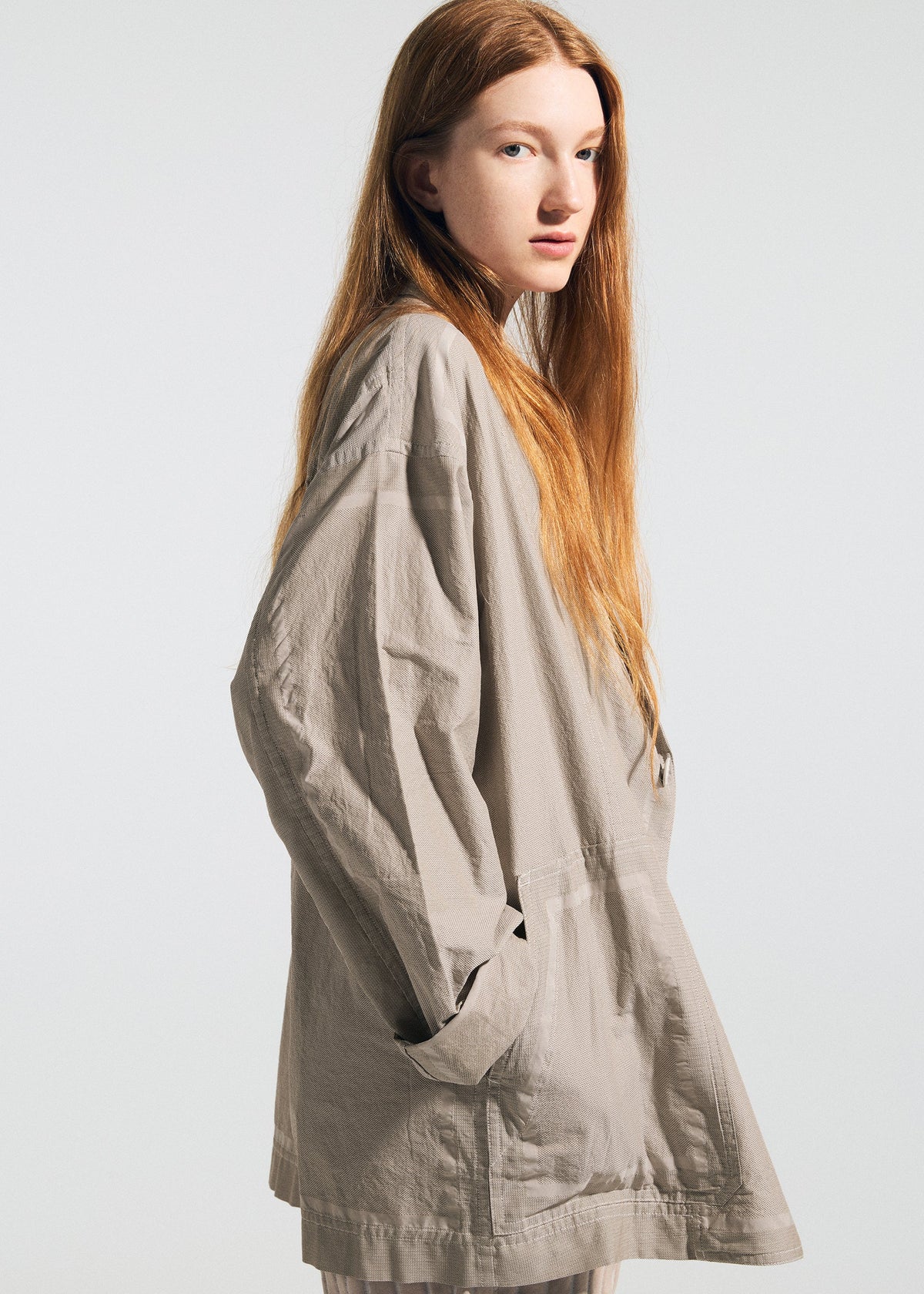 A model wears the A-POC ABLE ISSEY MIYAKE TYPE U 002 jacket.