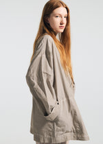 A model wears the A-POC ABLE ISSEY MIYAKE TYPE U 002 jacket.