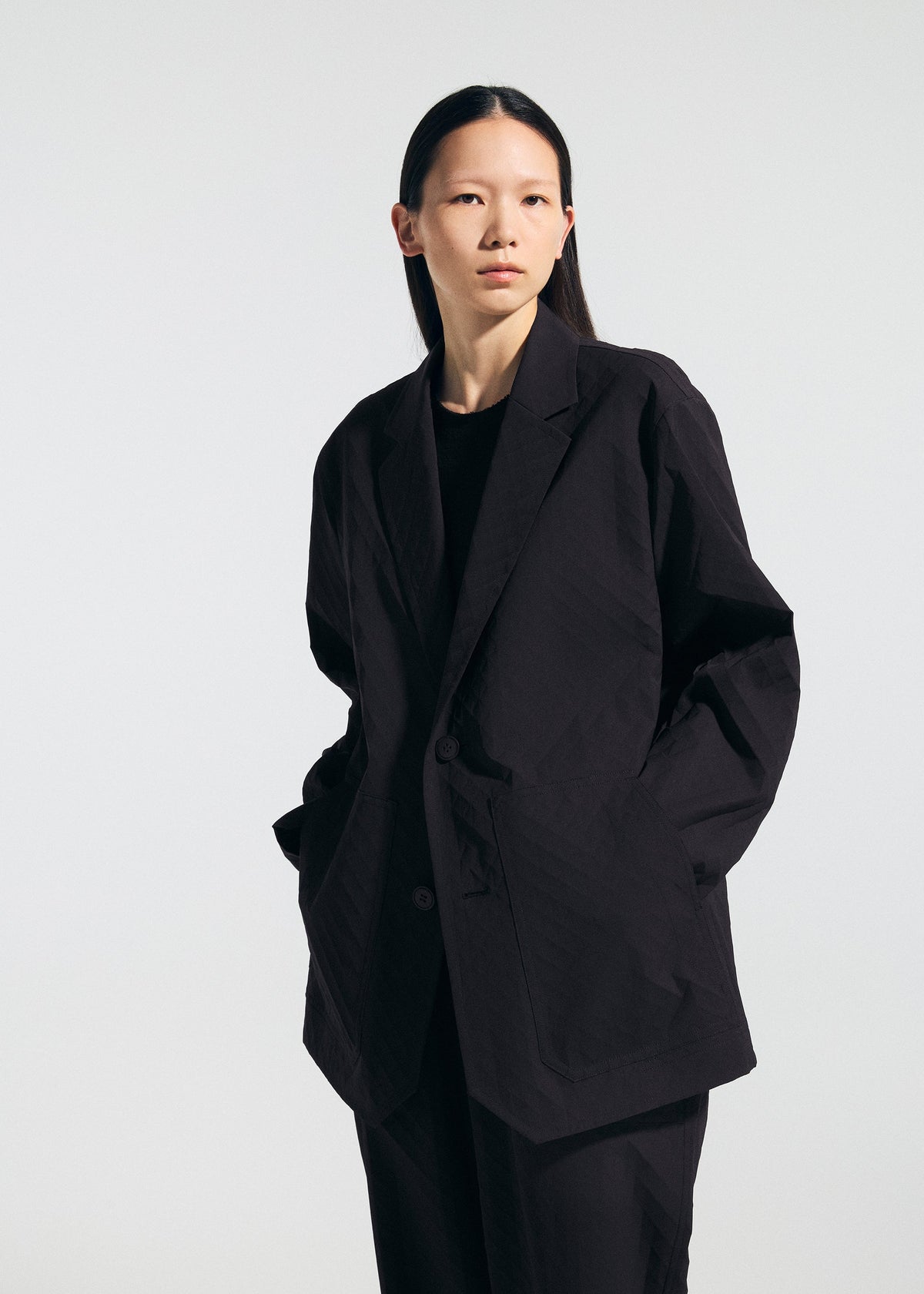 A model wears the A-POC ABLE ISSEY MIYAKE TYPE T 001 2 jacket.