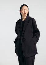 A model wears the A-POC ABLE ISSEY MIYAKE TYPE T 001 2 jacket.