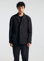 A model wears the A-POC ABLE ISSEY MIYAKE TYPE-O 014 type-o-014-jacket-steel-blue-1.