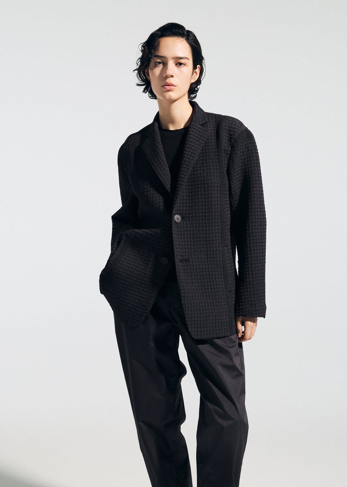 A model wears the A-POC ABLE ISSEY MIYAKE TYPE-O 014 type-o-014-jacket-steel-blue-1.