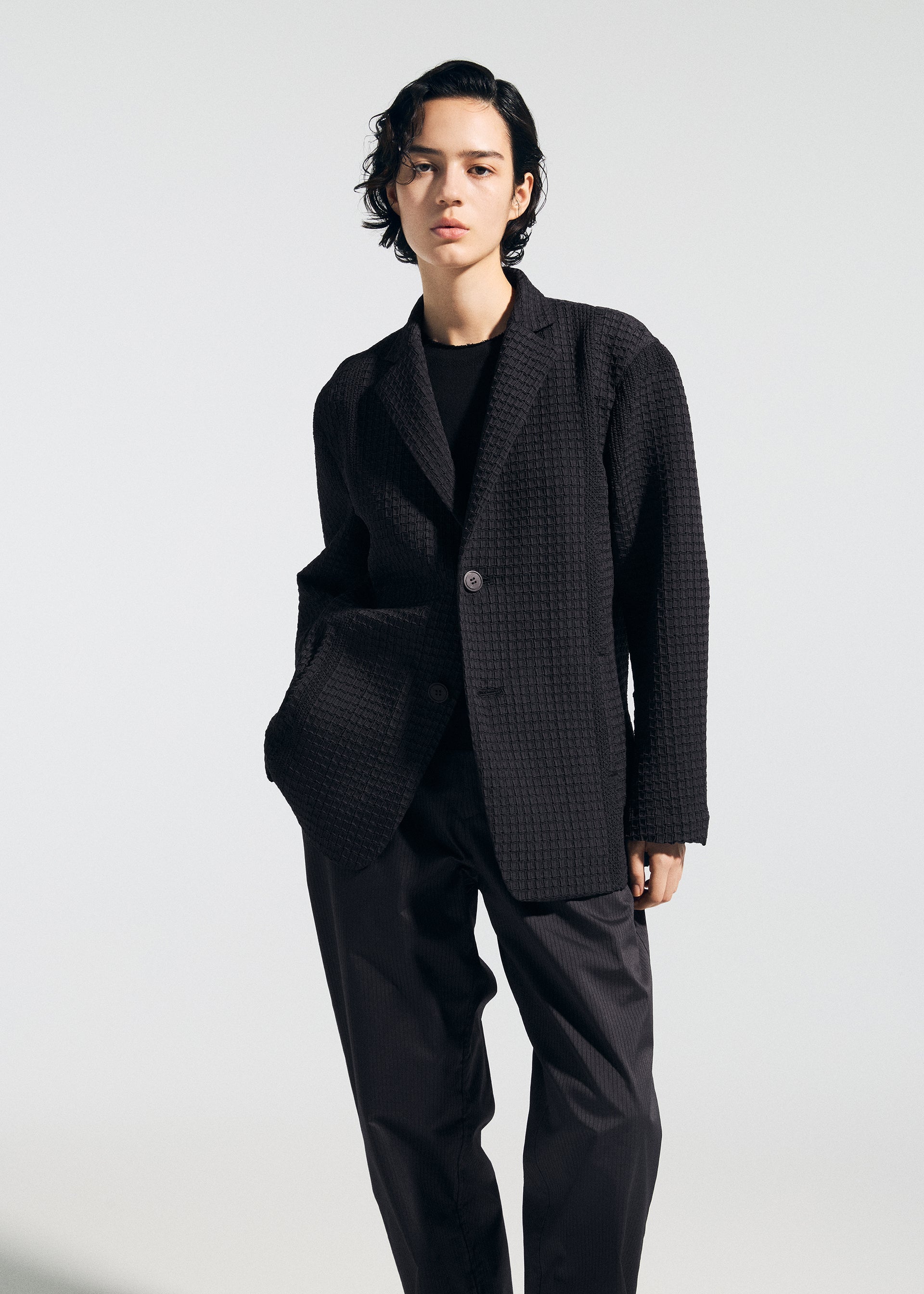 A model wears the A-POC ABLE ISSEY MIYAKE TYPE-O 014 type-o-014-jacket-steel-blue-1.