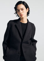 A model wears the A-POC ABLE ISSEY MIYAKE TYPE-O 014 type-o-014-jacket-steel-blue-1.