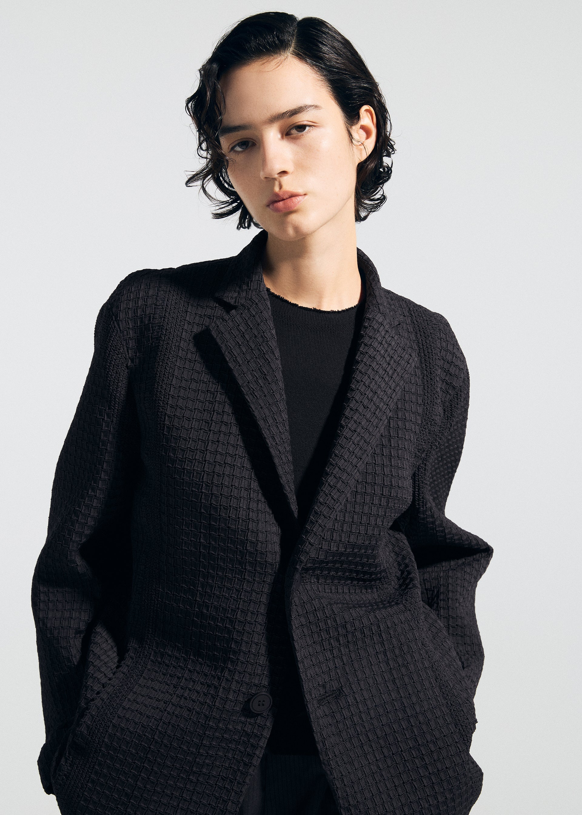 A model wears the A-POC ABLE ISSEY MIYAKE TYPE-O 014 type-o-014-jacket-steel-blue-1.