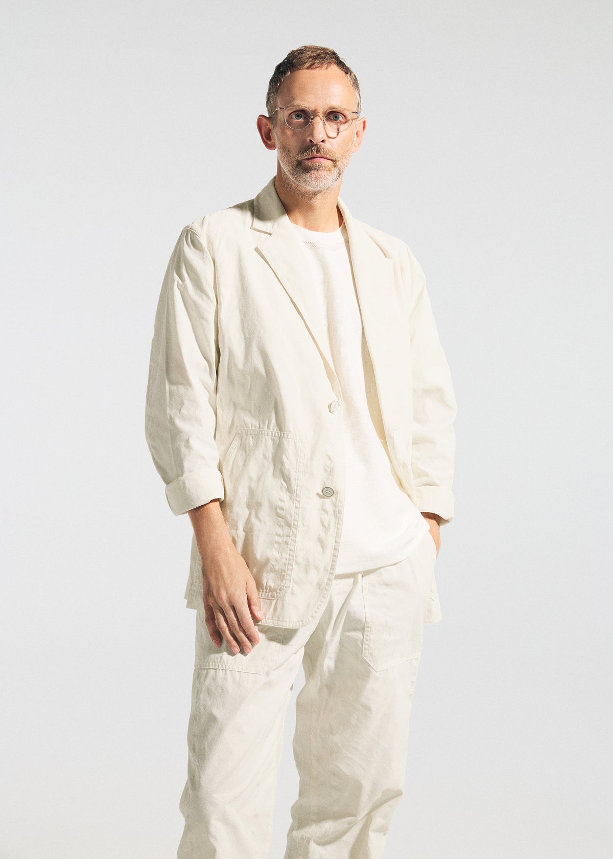 A model wears the A-POC ABLE ISSEY MIYAKE TYPE-U 001 type-u-001-trousers-ivory.