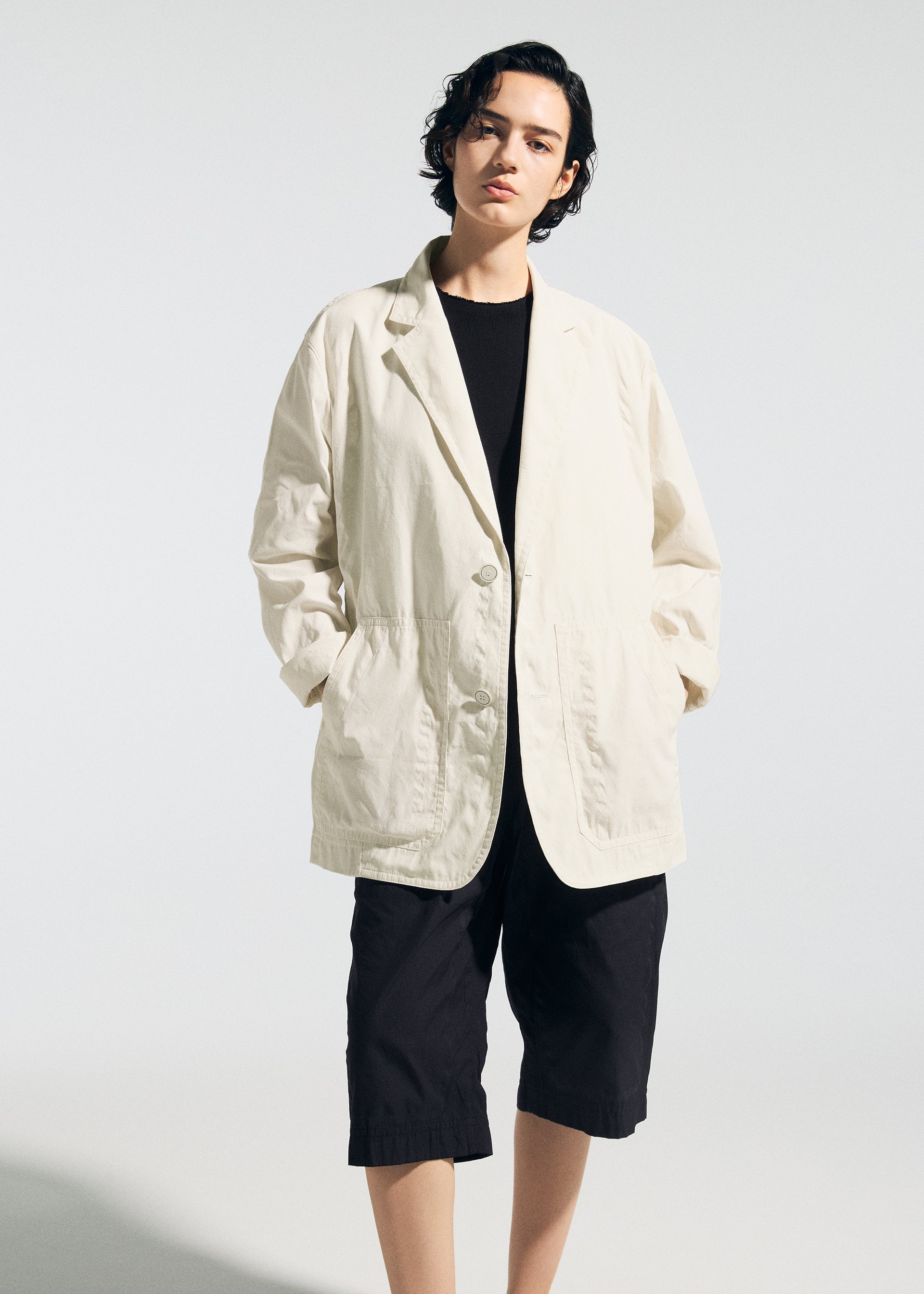 A model wears the A-POC ABLE ISSEY MIYAKE TYPE-U 001 type-u-001-shorts-black.